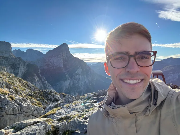 Denis Konnov hiking in the mountains